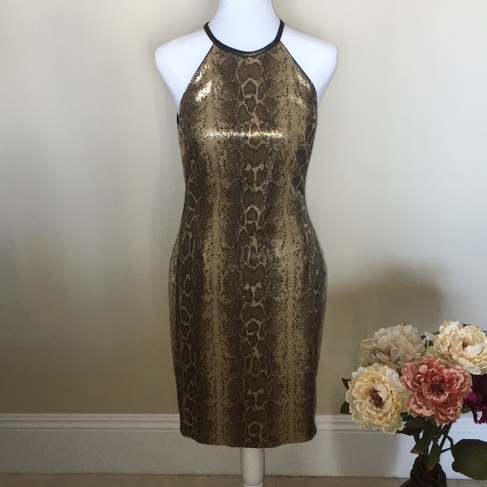 Sequined cocktail dress by Cache in stunning reptile design, size 4.